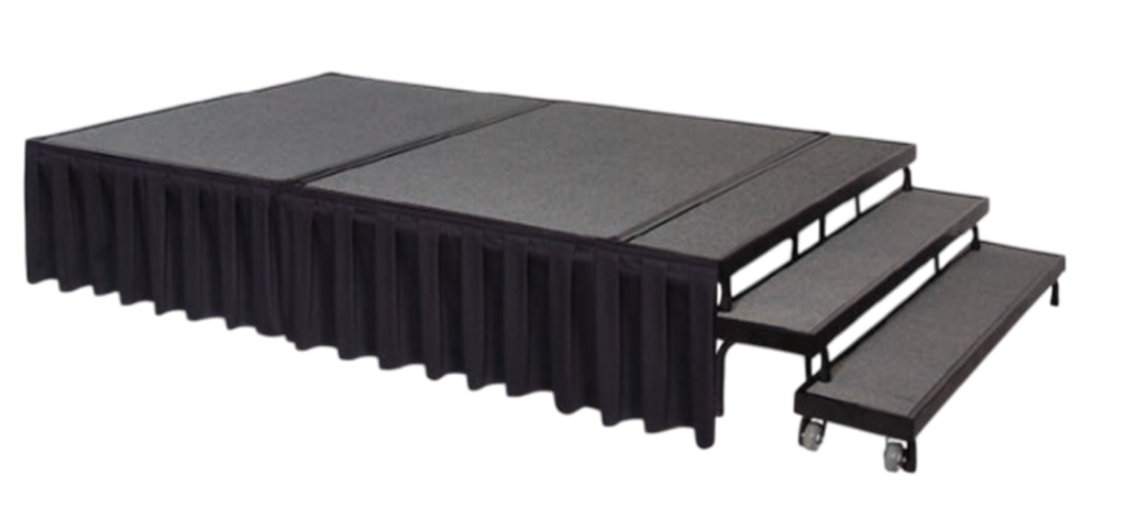 Segurança e Agilidade para Grandes Apresentações O Palco PD da Tomberlin foi desenvolvido rigorosamente para atender às demandas de hotéis, auditórios e centros de convenções que necessitam de plataformas modulares seguras e de rápida montagem. Ideal para palestras, shows e apresentações, ele entrega a robustez estrutural necessária para garantir a integridade dos palestrantes e artistas. Superfície Estável e Acabamento Premium Para suportar cargas elevadas sem ceder, o palco possui um tampo resistente fabricado em compensado multilaminado de 18 mm de espessura. Para garantir conforto acústico e segurança contra escorregões, a superfície é totalmente revestida em carpete de 5mm. Estrutura de Alta Performance A base de sustentação é fabricada com uma robusta estrutura em aço carbono. O chassi recebe o exclusivo tratamento nanocerâmico, garantindo proteção extrema contra a oxidação. Para assegurar a fixação perfeita no solo, o equipamento conta com pés antiderrapantes. Manuseio Inteligente e Seguro Pernas Dobráveis: Pensando na otimização do armazenamento e na agilidade logística da sua equipe, a estrutura conta com pernas dobráveis. Sistema de Travas Automáticas: A montagem é extremamente prática e à prova de falhas, graças ao sistema de dobradiças equipado com travas automáticas. Especificações Técnicas: Modelo: Palco PD. Estrutura: Aço carbono com exclusivo tratamento nanocerâmico. Tampo: Compensado multilaminado 18 mm revestido em carpete 5mm. Cores: Consulte a disponibilidade de cores. Modelos e Medidas : REF PD114: Comprimento 110 cm | Altura 45 cm | Peso 38 kg. REF PD116: Comprimento 110 cm | Altura 60 cm | Peso 39,9 kg. REF PD164: Comprimento 160 cm | Largura 110 cm | Altura 45 cm | Peso 42 kg. REF PD166: Comprimento 160 cm | Largura 110 cm | Altura 60 cm | Peso 43,9 kg. REF PD224: Comprimento 220 cm | Altura 45 cm | Peso 55 kg. REF PD226: Comprimento 220 cm | Altura 60 cm | Peso 56,3 kg.